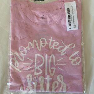 Never used, still packaged “promoted to big sister” pink tee